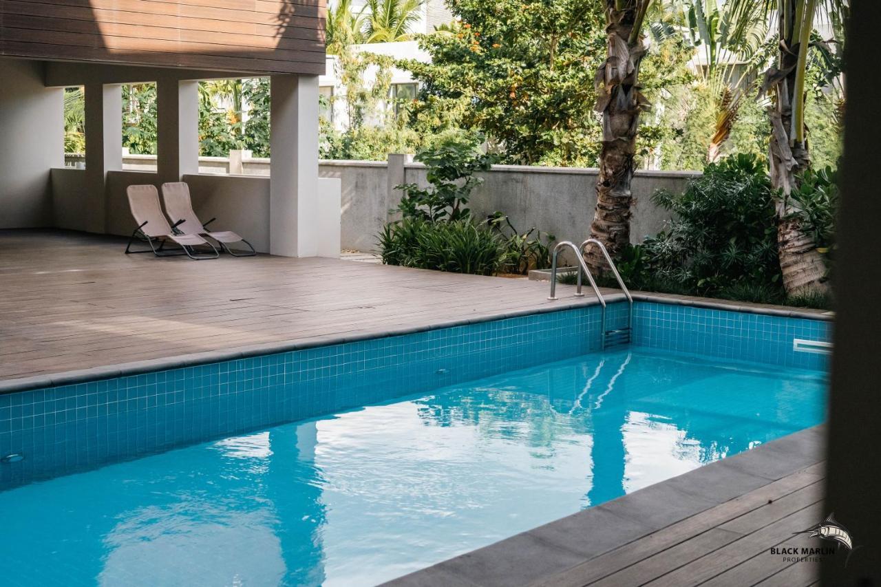 Black Marlin Apartments Pereybere Beach ภายนอก รูปภาพ
